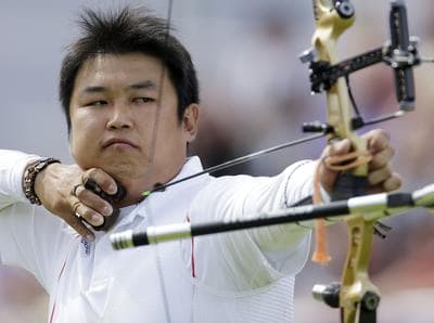 South Korea's Oh Jin-hyek shoots for a gold in the Olympic men's individual archery competition in London. (AP)