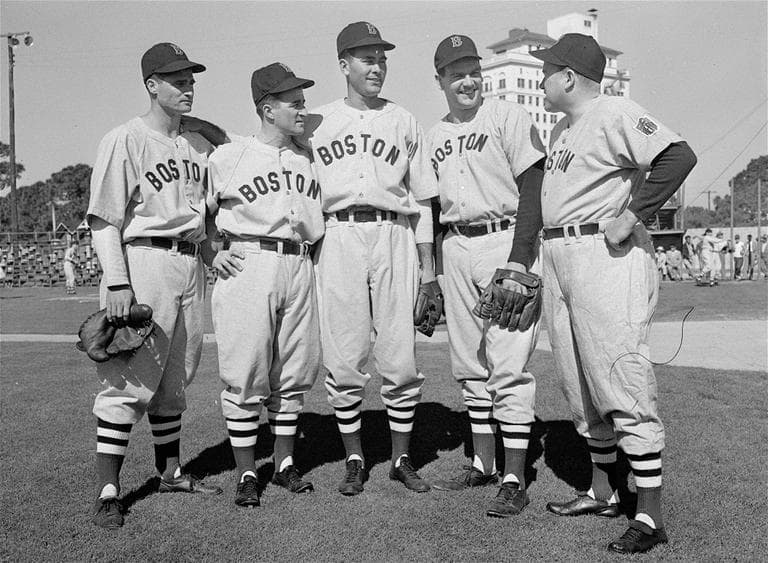 Left to right:  Bobby Doerr, veteran second baseman ; Johnny Pesky, shortstop; Tex Hughson; David M. Ferriss, Red Sox hurler who won 21 and lost 10 for the team last season; and manager Joe Cronin.  (AP Photo)