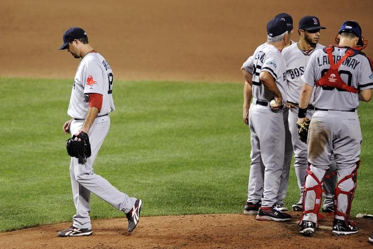 Josh Beckett exits the mound after he was pulled by manager Bobby Valentine during the sixth inning against the Baltimore Orioles Tuesday. (AP)