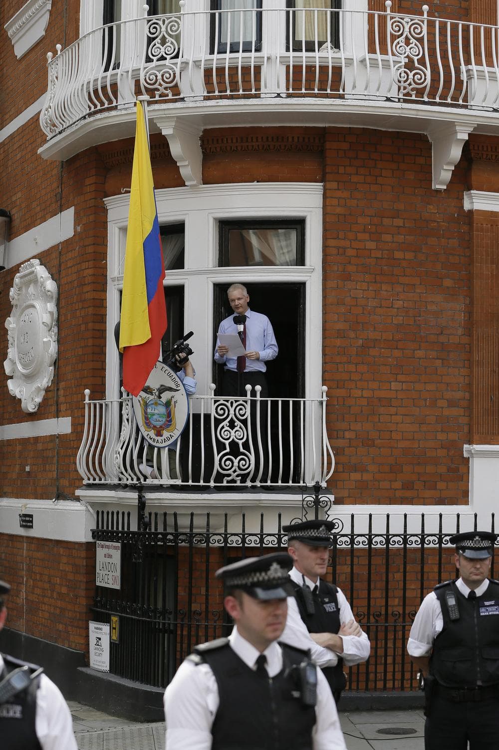 Julian Assange, founder of WikiLeaks, makes a statement from a balcony of the Equador Embassy in London. (AP)