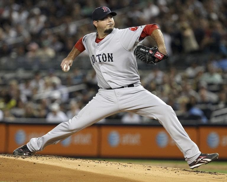 Josh Beckett pitches during the first inning of the baseball game against the New York Yankees on Sunday. (AP/Seth Wenig)