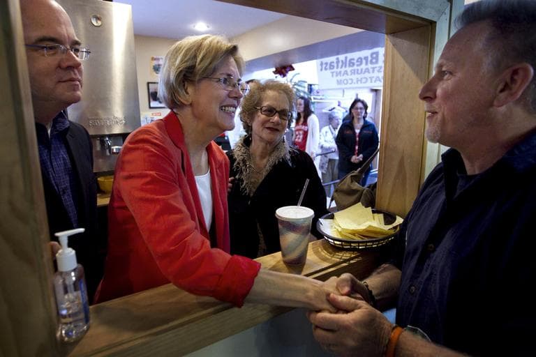 Elizabeth Warren, center, campaigns in Shrewsbury in April. With her, at left, is Rep. Jim McGovern. (AP)
