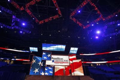 Republican National Committee Chairman Reince Priebus, left, and convention CEO William Harris unveil the stage and podium for the 2012 Republican National Convention, Monday, Aug. 20, 2012, at the Tampa Bay Times Forum in Tampa, Fla. (AP)