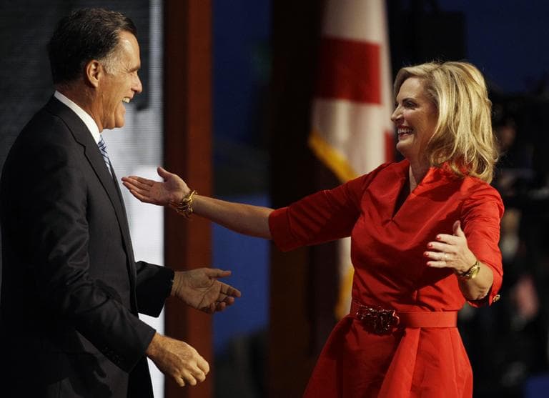Ann Romney reaches out to hug her husband, Republican presidential nominee Mitt Romney, after she addressed the Republican National Convention in Tampa, Fla., on Tuesday. (AP)