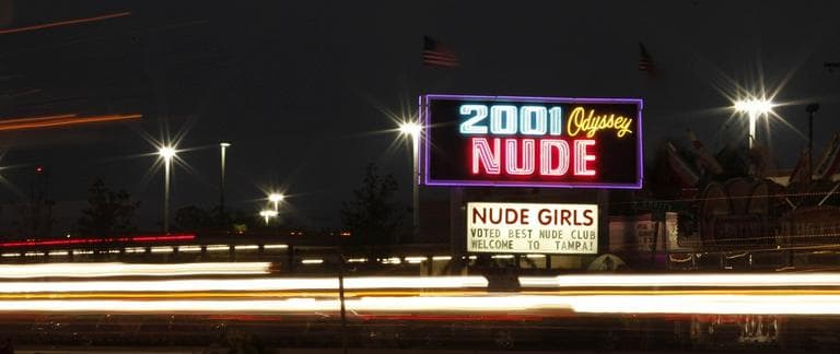 A strip club is seen on West Kennedy Boulevard in Tampa, Fla. A 10 minute drive from the Republican National Convention. (AP/Charlie Riedel)