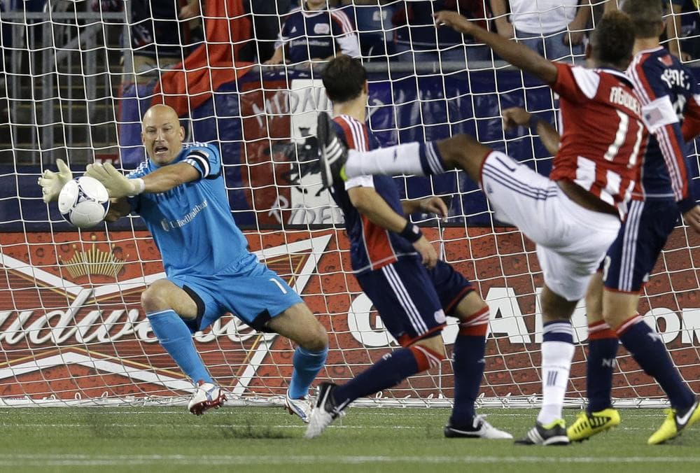 New England Revolution goalkeeper Matt Reis makes a save against a shot by Chivas USA forward Juan Agudelo during the second half of last night&#039;s match in Foxborough, which ended in a 3-3 tie. (AP Photo