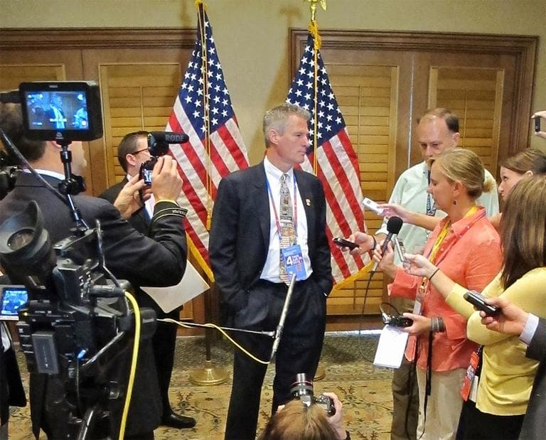 Sen. Scott Brown takes questions from reporters in Tampa Thursday afternoon. (Tiffany Campbell/WBUR)