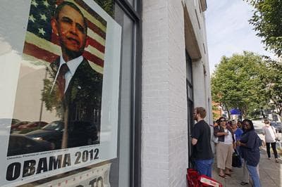 People wait outside a campaign field office in Raleigh, N.C., Thursday, Aug. 23, 2012 to receive credentials for President Barak Obama's acceptance speech during Charlotte's Democratic Convention. (AP)