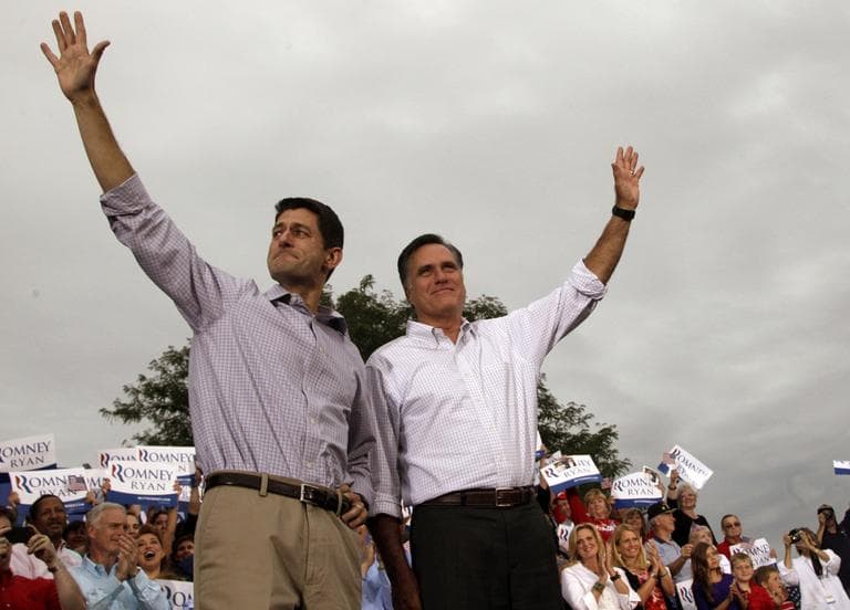 Republican presidential candidate, former Massachusetts Gov. Mitt Romney, right, and vice presidential running mate Rep. Paul Ryan of Wisconsin, greet the crowd during a campaign event at the Waukesha County Expo Center, Sunday, Aug. 12, 2012, in Waukesha, Wis. (AP)
