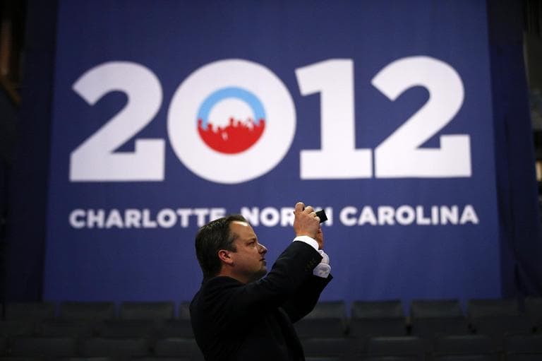 A man take pictures at the Democratic National Convention in Charlotte on Tuesday. (AP/Jae C. Hong)