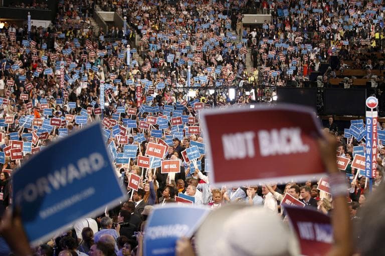 Delegates wave the signs during the Democratic National Convention in Charlotte, N.C., on Tuesday, Sept. 4, 2012. (AP)
