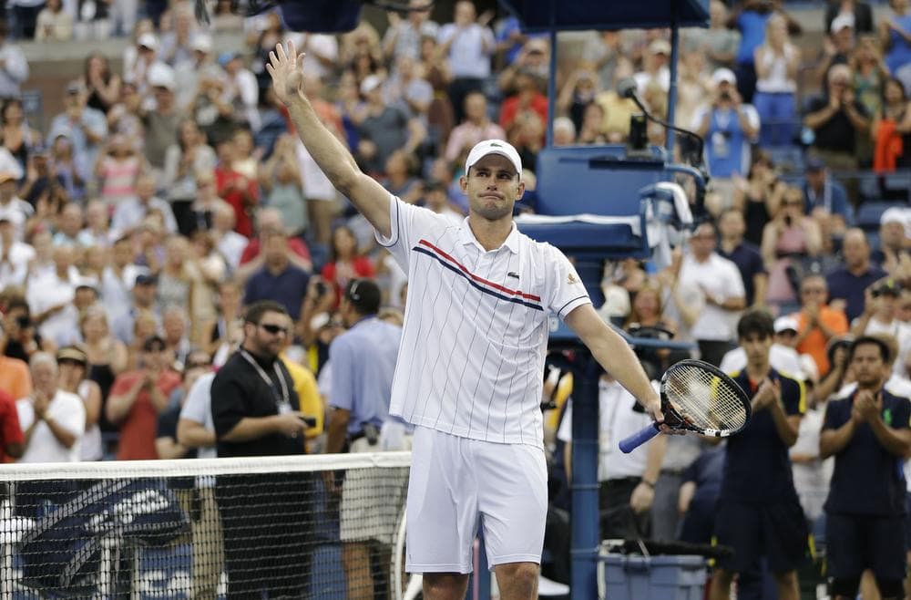 Andy Roddick bids farewell to fans at the US Open after his final professional match. (AP)