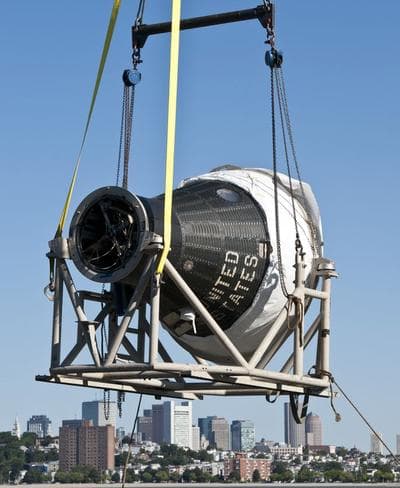 The Freedom 7 capsule is carried to Boston&#039;s John F. Kennedy Presidential Library &amp; Museum. (Courtesy)