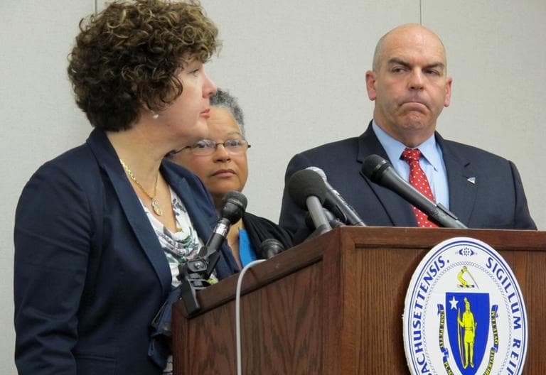 From left: Secretary of Public Safety Mary Beth Heffernan, Health and Human Services Secretary JudyAnn Bigby and State Police Col. Timothy Alben announce the drug lab personnel shakeup Thursday. (Andrea Shea/WBUR)