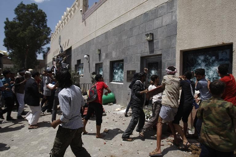 Yemeni protestors break windows of the U.S. Embassy during a protest about a film ridiculing Islam&#039;s Prophet Muhammad, in Sanaa, Yemen, Thursday. (AP)