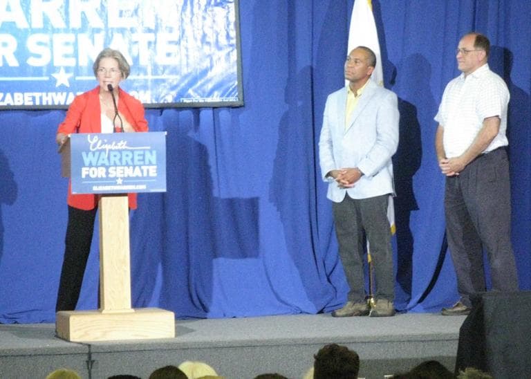 Democratic U.S. Senate candidate Elizabeth Warren speaking at Boston University with Gov. Deval Patrick and Rep. Michael Capuano. (Fred Thys/WBUR)