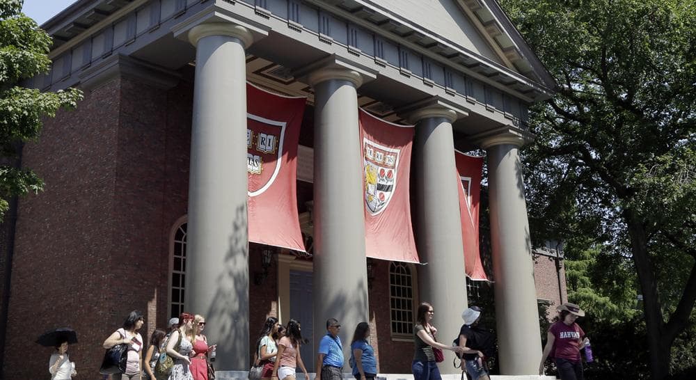 Harvard says it is taking a recent investigation into widespread cheating very seriously. But sportswriter Peter May says by buffering student athletes, the university is sending a very different message. (AP Photo)