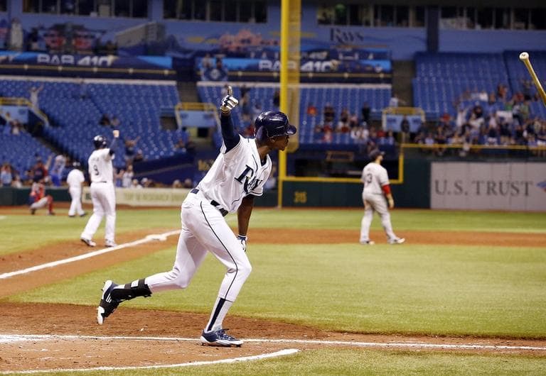 Tampa Bay Ray&#039;s B.J. Upton reacts after hitting the game winning home run in the bottom of the ninth inning to  give the Rays a 7-4 win over the Boston Red Sox . (AP/Scott Iskowitz)