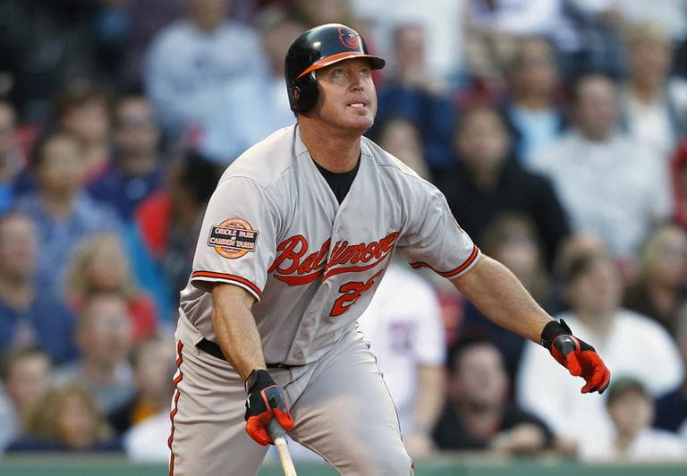 Baltimore Orioles' Jim Thome watches his ground-rule double that drove in the go-ahead run in the 12th inning against the Boston Red Sox Saturday, Sept. 22, 2012. (AP)