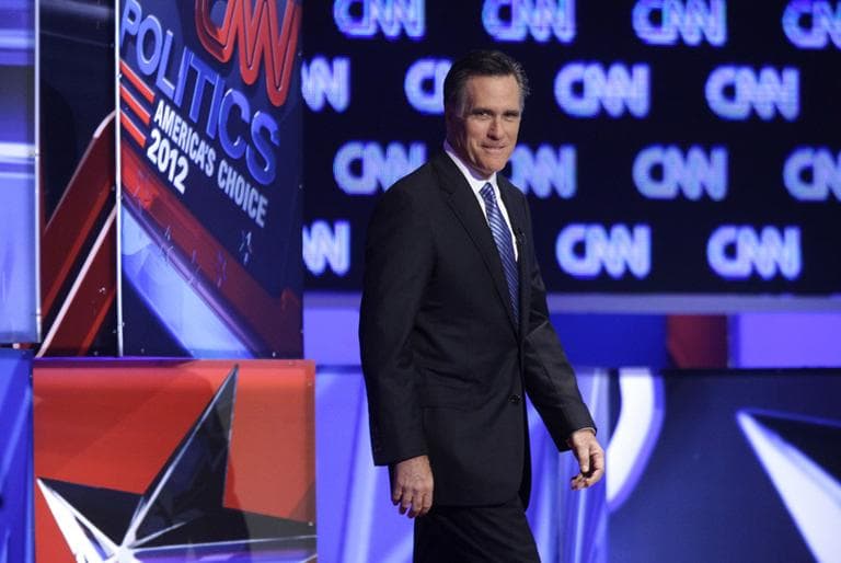 Mitt Romney takes the stage before the start of a Republican presidential debate in January. (AP)