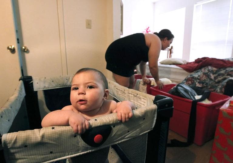 Zenobia Bechtol, 18, and her seven-month-old baby girl Cassandra, live in the dining room of her mother's apartment in Austin, Texas, Friday, Dec. 14, 2011, after Bechtol and her boyfriend were evicted from their apartment after he lost his job. The latest census data paint a bleak picture of a shrinking middle class amid persistently high unemployment and a fraying government safety net. (AP)