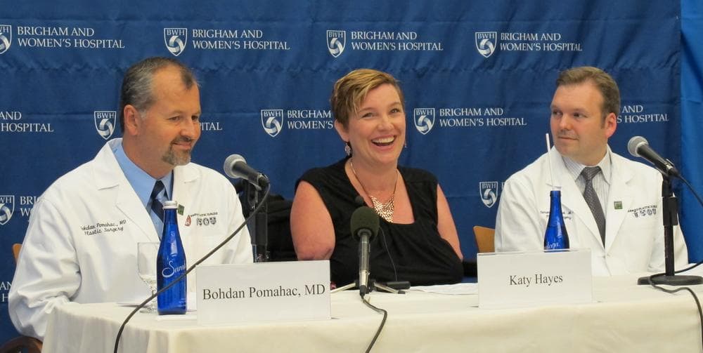 Double arm transplant candidate Katy Hayes smiles at a press conference at Brigham and Women's Hospital in Boston, Sept. 12, 2012. (Curt Nickisch/WBUR)