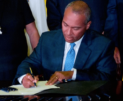Gov. Patrick moves from signing to implementing health care costs law (Jesse Costa/WBUR).
