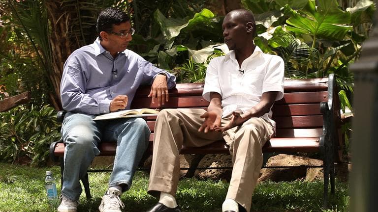 Director Dinesh D'Souza interviews George Obama in "2016: Obama's America." (AP /Rocky Mountain Pictures)