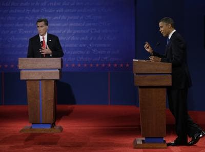 Republican presidential nominee Mitt Romney, left, and President Barack Obama speak during the first presidential debate at the University of Denver, Wednesday, Oct. 3, 2012, in Denver. (AP)