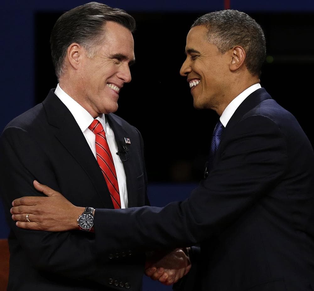 Republican presidential nominee Mitt Romney and President Barack Obama shake hands during the first presidential debate, Weds., Oct. 3, 2012, in Denver. (AP Photo/Charlie Neibergall)