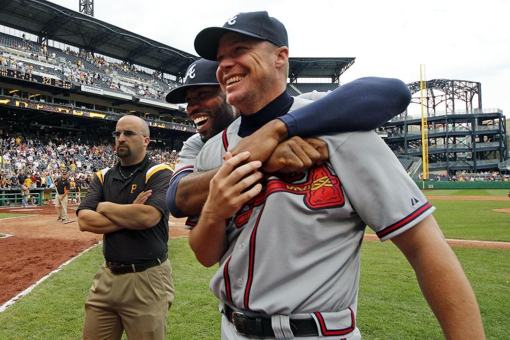 Chipper Jones and Jason Heyward after the Atlanta Braves' 4-0 win over the Pittsburgh Pirates in their final regular-season game. The Braves face the St. Louis Cardinals for a wild card playoff spot. (AP/Gene J. Puskar)