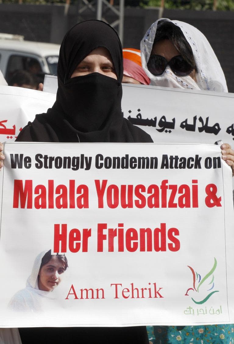 Pakistani protesters rally on Wednesday to condemn the attack on schoolgirl Malala Yousufzai. (Mohammad Sajjad/AP)