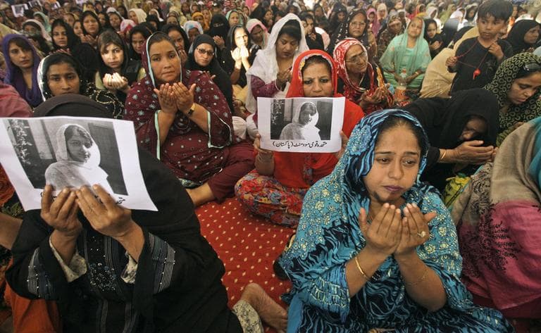 Supporters of Pakistani political party Muttahida Qaumi Movement chant prayers in support of 14-year-old schoolgirl Malala Yousufzai, who was shot on Tuesday by the Taliban for speaking out in support of education for women. (Shakil Adil/AP)