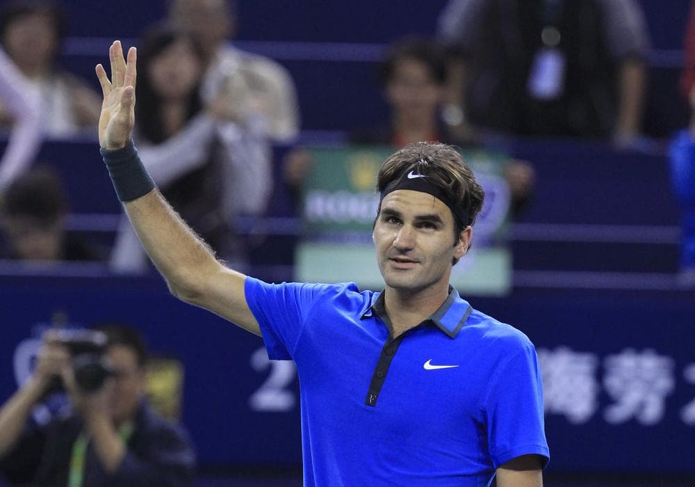 This week marks Roger Federer's 300th week in his career as the ATP Tour's No. 1 player. Pete Sampras held the previous record of 286 weeks. (AP/Eugene Hoshiko)