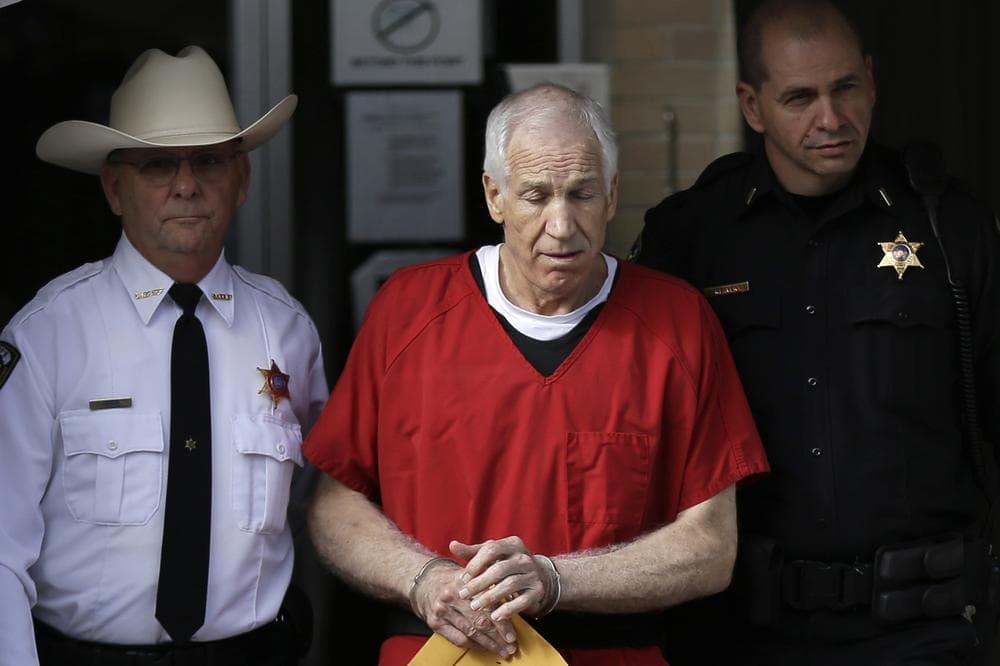 Former Penn State University assistant football coach Jerry Sandusky leaves the Centre County Courthouse Tuesday after being sentenced for child sexual abuse. (AP/Matt Rourke)