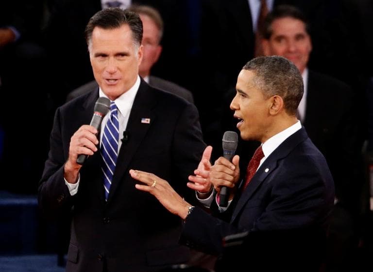 President Obama and Republican presidential candidate Mitt Romney speak during the second presidential debate at Hofstra University in Hempstead, N.Y., on Tuesday. (AP/Charles Dharapak)