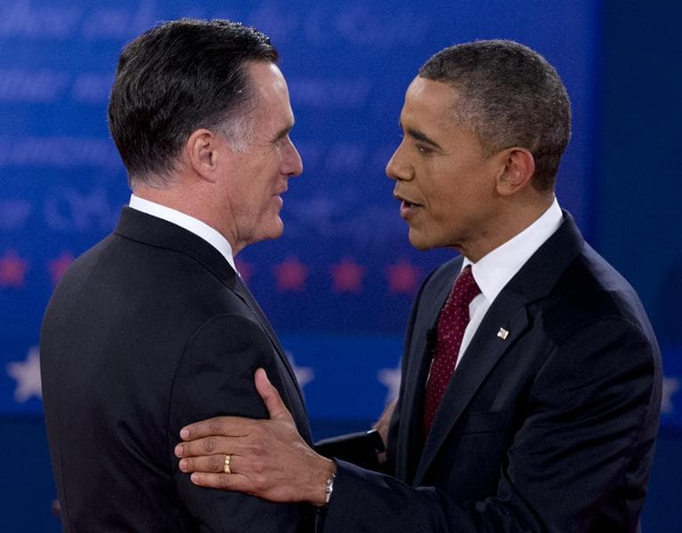 President Obama and Republican presidential candidate Mitt Romney greet each other at the second presidential debate, on Oct. 16. (Carolyn Kaster/AP)