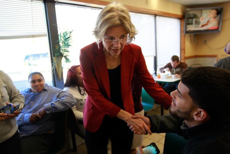 Democratic U.S. Senate candidate Elizabeth Warren campaigns at the Puerto Rico Bakery in Springfield Monday. (Steven Senne/AP)