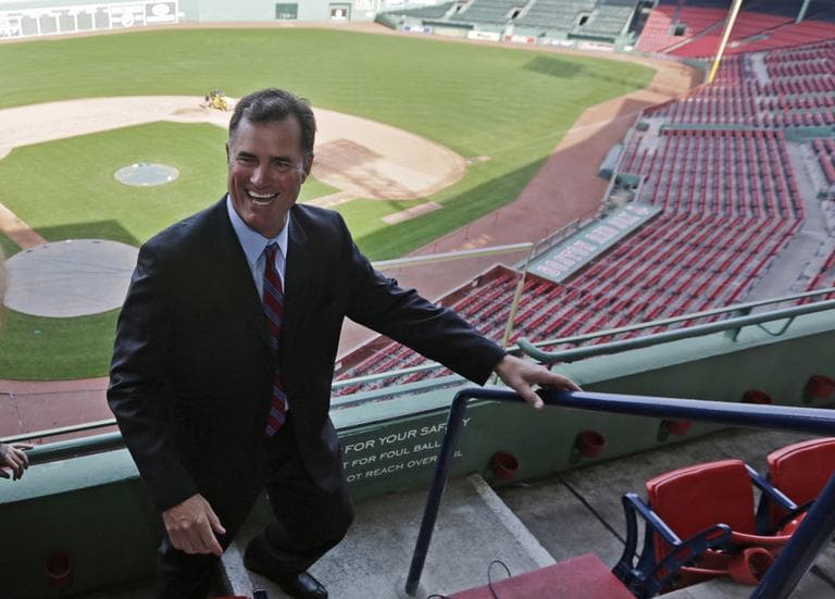 John Farrell walks through the stands at Fenway Park on Tuesday after being introduced as the Red Sox 46th manager. (Charles Krupa/AP)