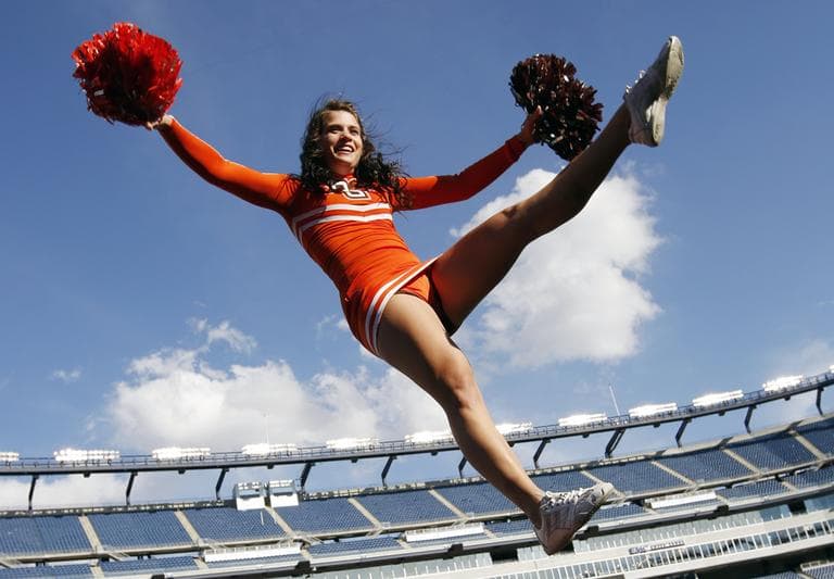 A Bowling Green cheerleader performs during an NCAA college football game against Massachusetts in Foxborough, Mass., Saturday, Oct. 20, 2012. (AP)