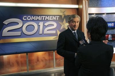 Democratic U.S. Rep. John Tierney talks with a reporter after his debate with Republican challenger Richard Tisei at WCVB-TV on Thursday. (Bill Greene/AP/The Boston Globe, Pool)