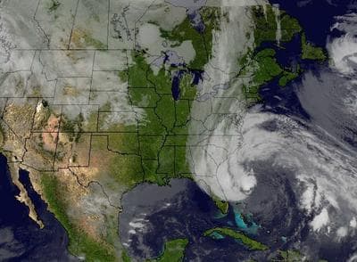Cloud cover from Hurricane Sandy interacts with the long line of clouds associated with the cold front approaching the eastern U.S. The composite image was created using the Space Science and Engineering Center's McIDAS software and the National Oceanic and Atmospheric Administration's GOES imager satellite imagery. (NOAA/UWI/SSEC)