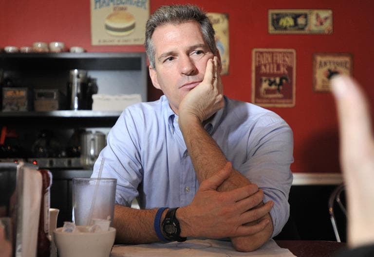 Sen. Scott Brown speaks with reporters at Mul's Diner in Boston in 2011. (Josh Reynolds/AP)