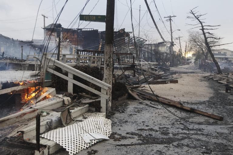 Damage caused by a fire at Breezy Point is shown on Tuesday in the New York City borough of Queens. The fire destroyed between 80 and 100 houses Monday night in the flooded neighborhood. (Frank Franklin II/AP)