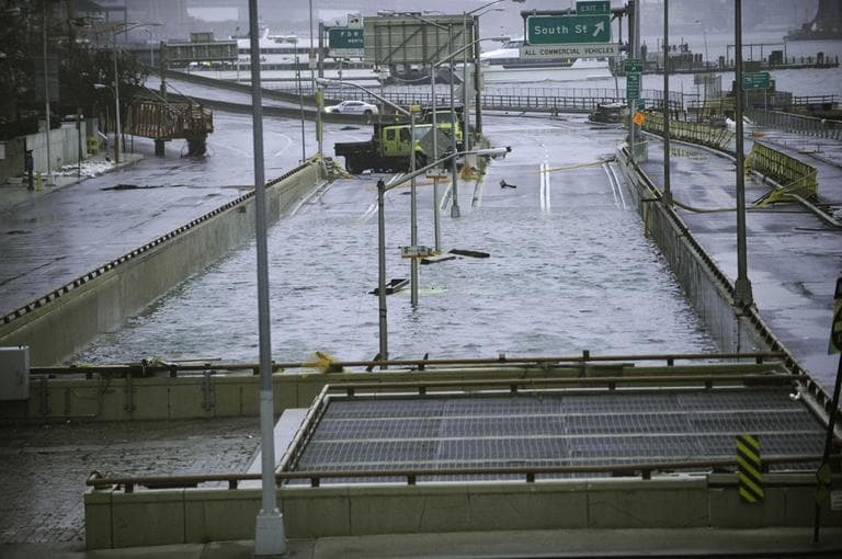 Water reaches the street level of the flooded Battery Park Underpass on Tuesday. (Louis Lanzano/AP)