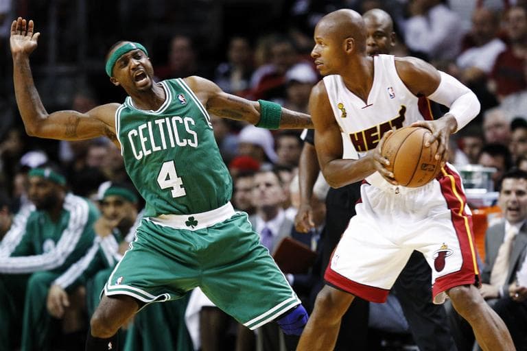 Boston Celtics' Jason Terry tries to block Miami Heat's Ray Allen, formerly of the Celtics, on Tuesday in Miami. The Heat won 120-107. (J Pat Carter/AP)