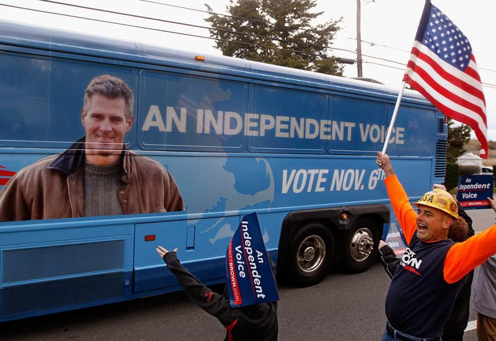 Sen. Scott Brown's campaign bus pulls up to &quot;Grumpy's Restaurant&quot; in East Dennis, Mass., on Saturday. (Stephan Savoia/AP)