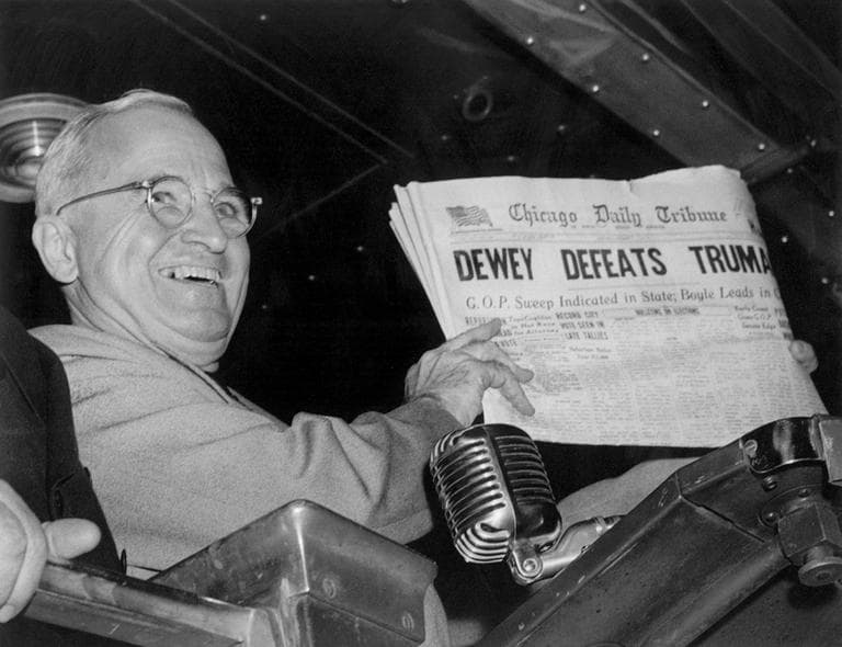 In November 1948, President Harry S. Truman holds up an election day edition of the Chicago Daily Tribune, which, based on early results, mistakenly announced "Dewey Defeats Truman." (Byron Rollins/AP)
