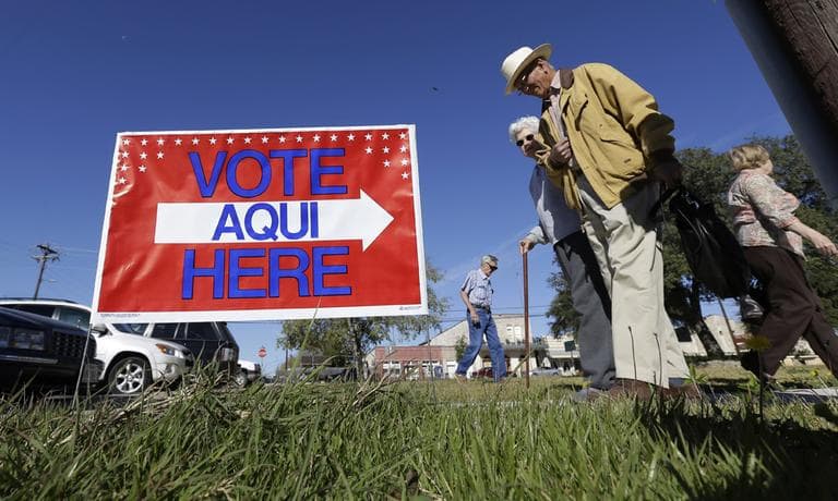 Voters leave the Old Blanco Courthouse after casting their ballots on Tuesday in Blanco, Texas. (Eric Gay/AP)