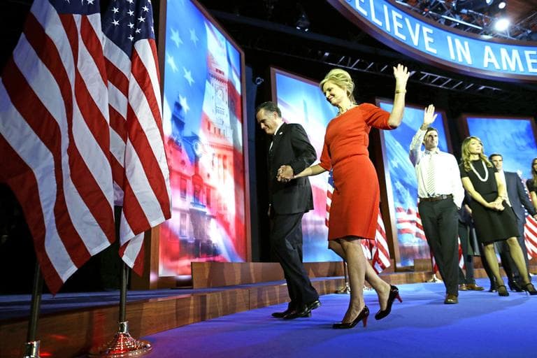 Republican presidential candidate and former Massachusetts Gov. Mitt Romney walks off stage with his wife Ann Romney after he arrives gave his concession speech at his election night rally in Boston, early Wednesday morning. (AP Photo/Charles Dharapak)